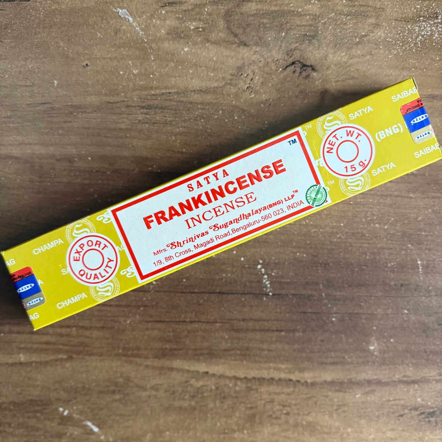 Satra frankincense incense packaging on a wooden surface