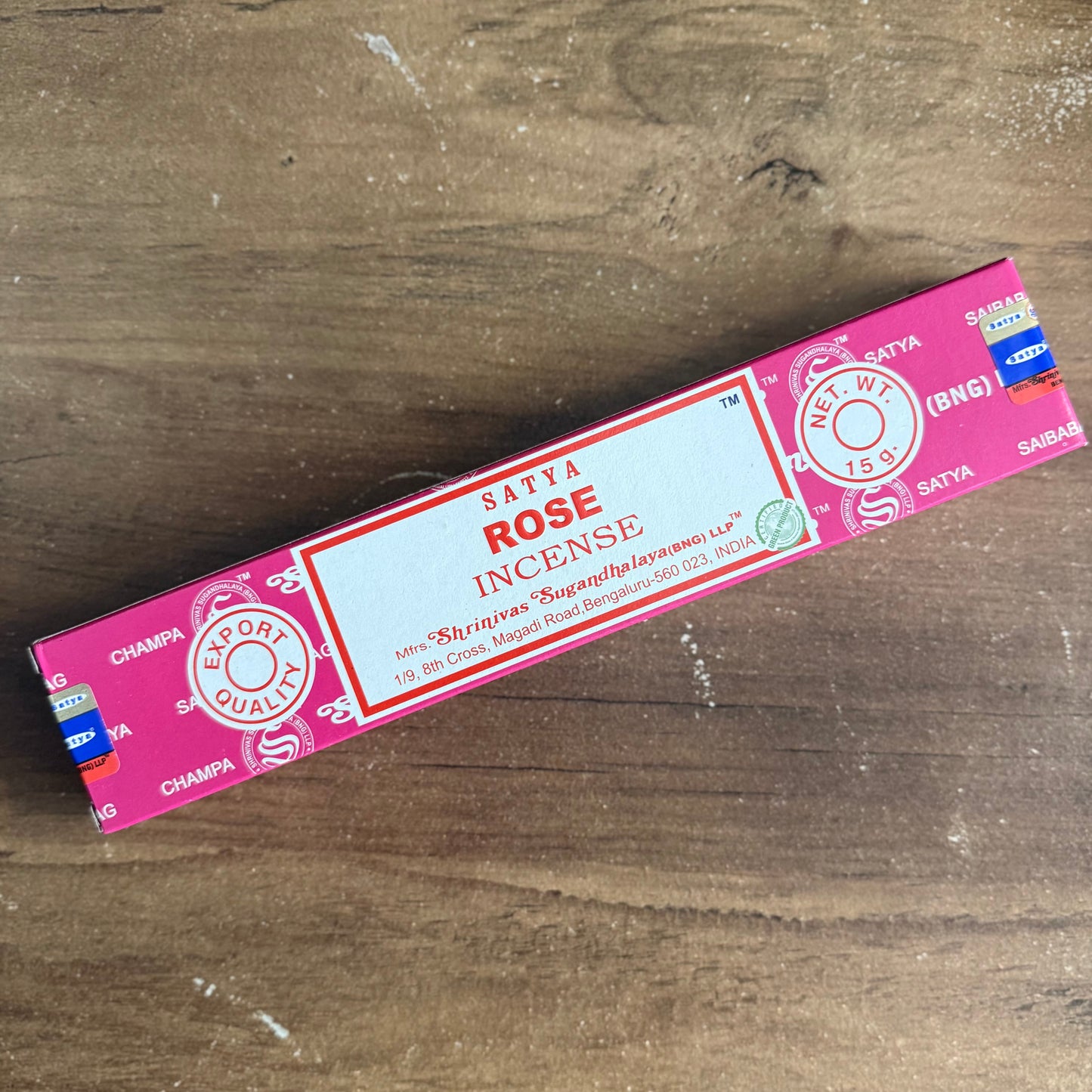 Box of Satya Rose Incense on a wooden surface