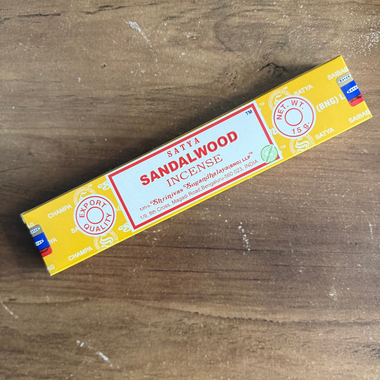 Box of Satya Sandalwood Incense on a wooden surface